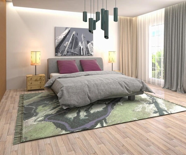 Modern bedroom with abstract green and grey area rug.