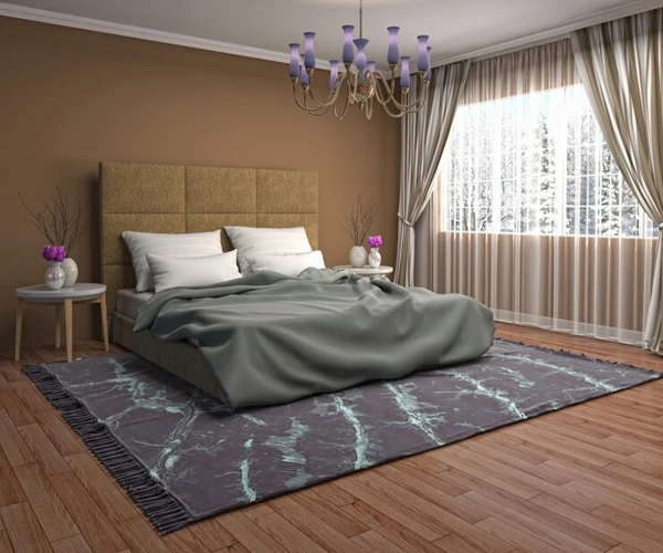 Stylish bedroom patterned rug and gold chandelier.