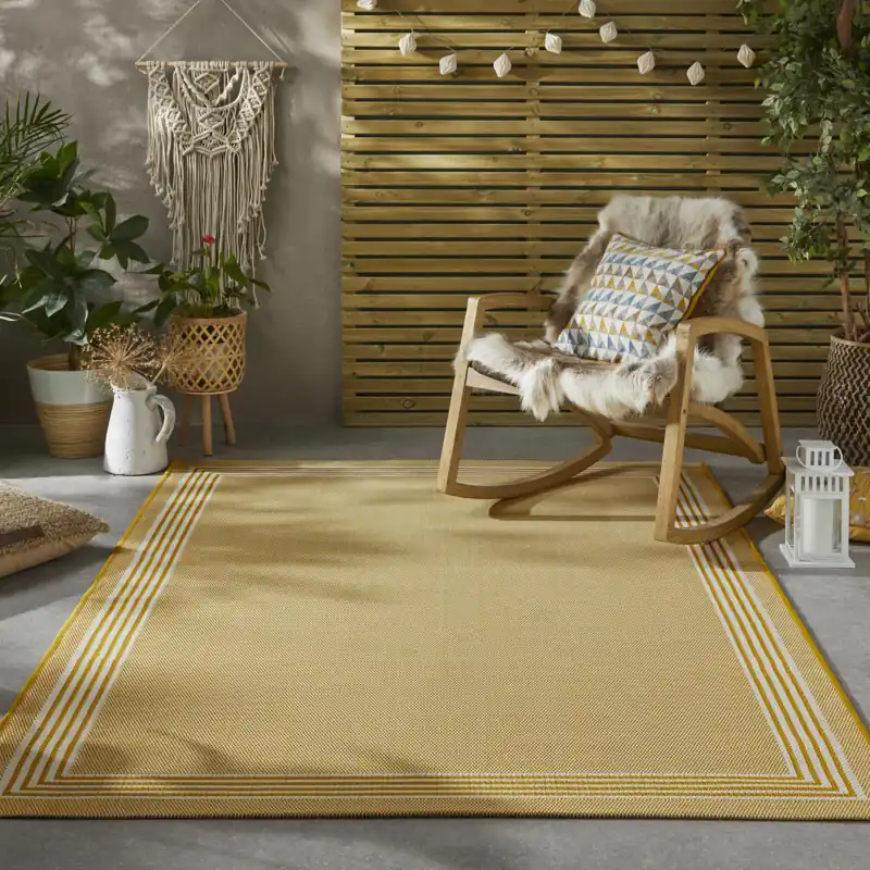 Durable outdoor carpet in neutral tones for backyard relaxation