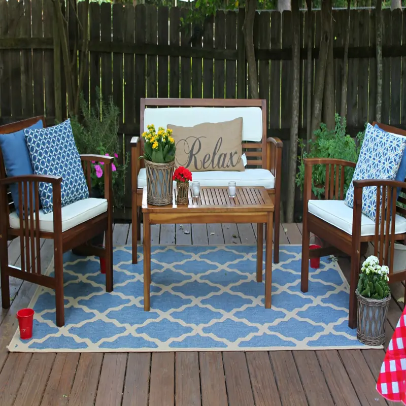 Modern outdoor rug adding a touch of summer to a backyard patio