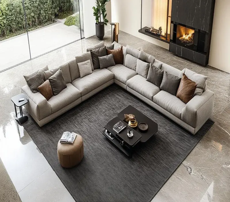Dark grey jute rug under large sectional